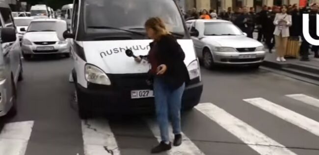 Armenia -- Police minivan hitting journalist covering street protests, Yerevan, 20May2024